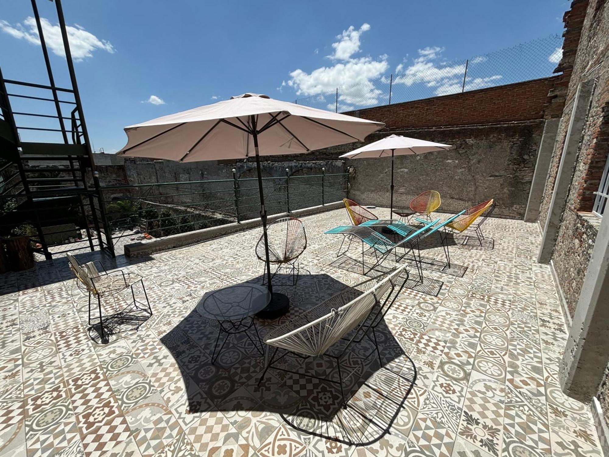 Hostal Casa De Arcos ปวยบลา ภายนอก รูปภาพ